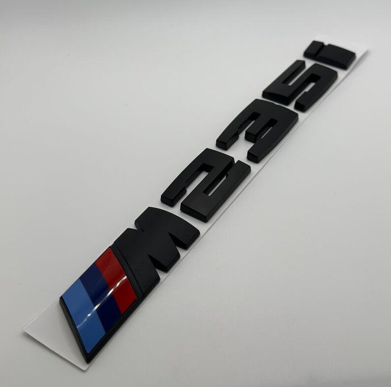 BMW M235i Black Emblem. Black BMW M235i Trunk Badge
